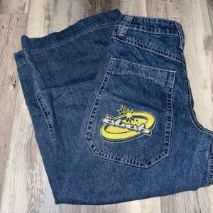 Stylish Blue Jeans with Graphic Accent